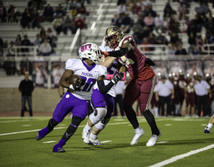 Paschal football player Marquez Dean (11) plays in the Saginaw game. 